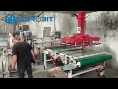 Macchine automatiche per il carico e lo scarico di lastre di mattoni con palletizzazione a strati completi