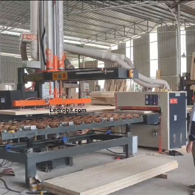 Macchina di carico e scarico automatico CNC con pulsante di arresto di emergenza